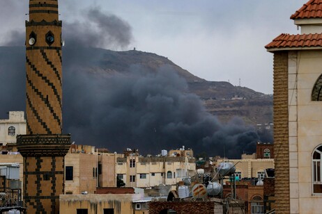 Smoke billows on the horizon following an Israeli air strike on Yemen's Huthi-held capital Sanaa