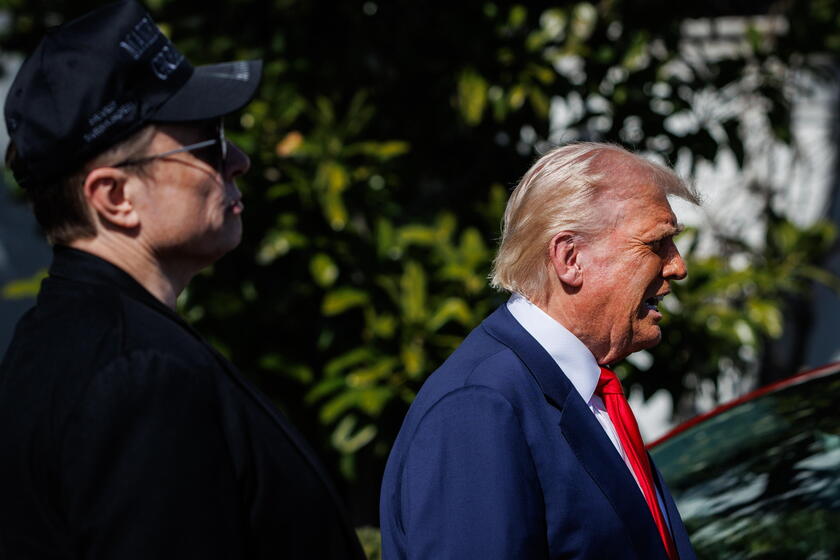 US President Trump views Tesla vehilces in front of the White House