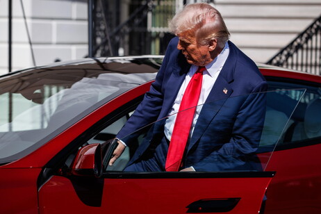 US President Trump views Tesla vehilces in front of the White House