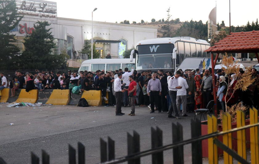 People who fled from southern Lebanon enter Syria following Israeli military strikes in recent days