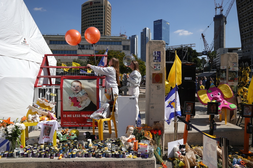 People gather in Tel Aviv to watch Bibas family funeral