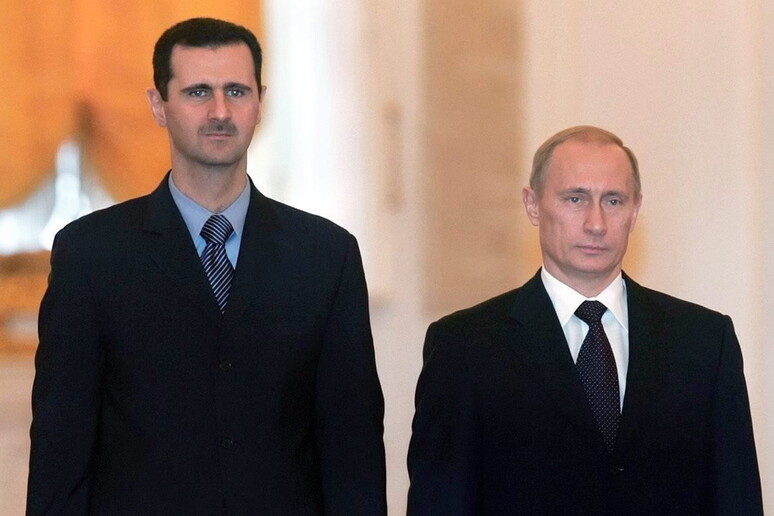 Assad e Putin in una foto d 'archivio - RIPRODUZIONE RISERVATA